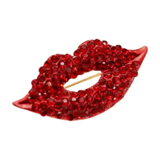Sparkly red lips brooch with vibrant rhinestones, enamel pin accessory on white background