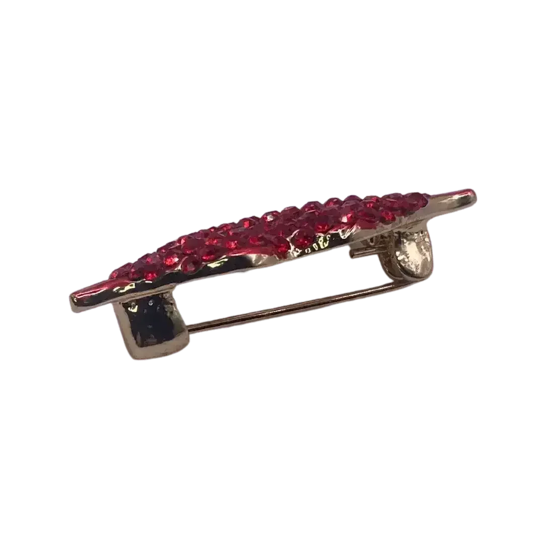 Red jeweled lips brooch with gold backing and safety clasp, playful pin accessory