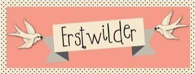 Erstwilder brand logo featuring two white birds on a pink background.
